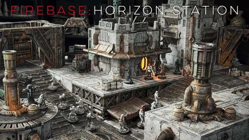 A detailed modular sci-fi terrain setup features various structures, including a large building with a glowing orange window and intricate textures, set against a backdrop of industrial elements. Several miniature figures are positioned throughout the scene, suggesting a skirmish or exploration scenario. The terrain is designed for tabletop gaming, showcasing a mix of crates, pipes, and machinery, all rendered in a weathered, metallic color palette.