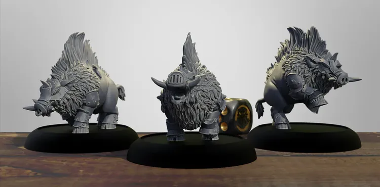 Three stylized miniature boars are displayed on black bases, showcasing their unique designs. Each boar features a thick, shaggy coat and prominent tusks, with one wearing a helmet and armor, suggesting a battle-ready appearance. The background is a simple, light color, allowing the details of the miniatures to stand out prominently.