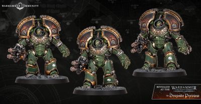 Two imposing Space Marine dreadnoughts stand side by side, showcasing intricate details and a striking green armor adorned with gold accents. Each dreadnought is equipped with a powerful weapon in one hand, featuring a fiery muzzle, while their other arms are armored and decorated with the iconic Aquila symbol. The backdrop is a dark, textured surface with faint maps and symbols, enhancing the dramatic presentation of these new miniatures.