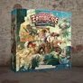 A colorful game box for "Zombicide: Dead Men Tales" features a dynamic scene of pirate characters battling against zombie hordes. The artwork showcases various pirates wielding weapons, with zombies emerging from the background, set against a backdrop of a coastal town and ships. The title is prominently displayed at the top, along with the names of the game designers.