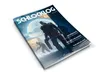A magazine titled "Schlocklog Vol. 6" is prominently displayed, featuring a dynamic cover illustration. The cover depicts three armored figures in a sci-fi setting, with a large, glowing moon in the background. Text on the cover highlights features such as "Necronauts," "Escape the Horde," and "The Dread Mist," indicating the content within the magazine related to the Star Schlock tabletop game.