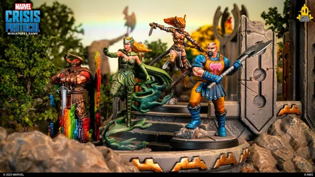 A detailed scene features four miniatures from the Marvel Crisis Protocol game, set against a backdrop of lush greenery and rocky terrain. Prominently displayed are Amora the Enchantress, wearing a green outfit and flowing hair, and Skurge the Executioner, who stands with a sword and a colorful, rainbow-like shield. In the background, additional characters and elements hint at the Asgardian theme, enhancing the vibrant and dynamic atmosphere of the tableau.