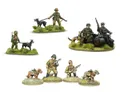 A collection of miniature figures showcases various dog-related models from Warlord Games. In the top section, a soldier with a dog is accompanied by two German soldiers on a motorcycle with a dog, all set on a grassy base. The bottom section features a soldier with a rifle alongside two additional figures, one holding a weapon and another with a dog wearing a pack, all on a similar grassy terrain.