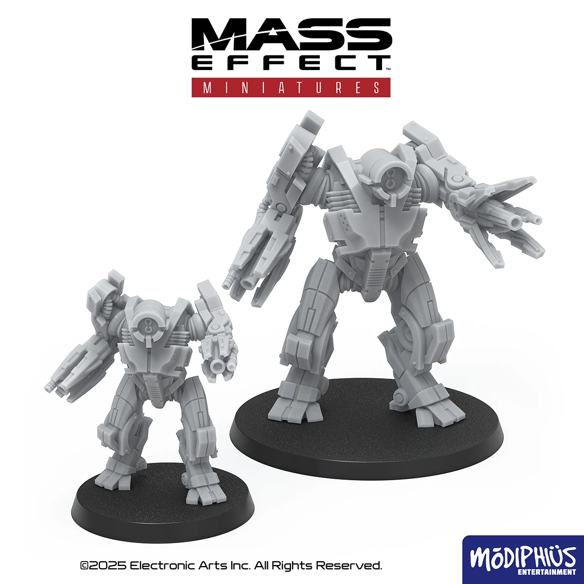 A pair of unpainted resin miniatures from the Mass Effect universe are displayed against a plain background. On the left, a smaller mech figure stands with a compact design, featuring articulated limbs and a rounded head. To the right, a larger mech figure showcases a more robust and detailed structure, with prominent joints and a more aggressive stance. Both figures are mounted on circular bases, emphasizing their scale difference. The Mass Effect logo is prominently featured at the top, along with the Modiphius Entertainment branding at the bottom.
