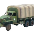 A military-style truck with a green body and a camouflaged canvas cover over the cargo area. The truck features a white star insignia on the side and has visible weathering and paint wear, indicating use. It has six wheels, with the front wheels showing a distinct tread pattern.