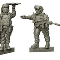 Three detailed miniature figures of U.S. Marines are displayed, each standing on a base labeled "WHITE DRAGON MINIATURES 2024." The first figure holds a weapon in one hand and gestures with the other, while the second figure points forward, equipped with tactical gear and a rifle. The third figure stands with a weapon slung, showcasing a realistic portrayal of modern military equipment.