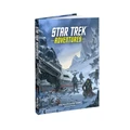 A full-color technical manual titled "Star Trek Adventures" is displayed, featuring a cover illustration of a snowy landscape with a crashed starship and several characters in sci-fi attire. The title is prominently featured at the top, with the subtitle "The Roleplaying Game Technical Manual" below it. The overall design conveys a sense of adventure and exploration within the Star Trek universe.