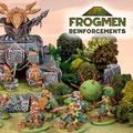 A vibrant scene showcases a variety of colorful Space Frogmen miniatures, including a frogman chieftain and cavalry, positioned around a rocky outcrop adorned with ancient symbols and a large decorative skull. Lush greenery and spiky plants surround the figures, enhancing the fantastical atmosphere. The text "FROGMEN REINFORCEMENTS" is prominently displayed in the corner, indicating the theme of the Kickstarter campaign.