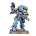 A Space Wolf Blood Claw miniature stands in a dynamic pose, wielding a chainsword in one hand and a pistol in the other. The miniature is painted in a striking blue color with yellow shoulder pads, showcasing intricate details and textures. It is mounted on a round base with a grassy terrain effect, emphasizing its role in the Warhammer 40,000 universe.