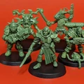 A group of five 28mm scale sci-fi miniatures is displayed against a bright red background. The figures include a Space Commando wielding a rifle, a Starchild with a distinctive helmet, an Assault Goar holding a sword, a Space Orc with a large gun, and a Voidborn equipped with various gadgets. Each miniature features intricate details and a classic old-school aesthetic, showcasing the unique character and charm of the RT Adventurer Pack II from Satyr Art Studios.