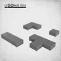 A collection of modular dungeon blocks in various shapes, all in a gray color, is displayed against a light background. The blocks include straight pieces, a corner piece, and a T-shaped piece, all featuring detailed stone textures that mimic the look of dungeon walls. This versatile set is designed for tabletop gaming, allowing for customizable dungeon layouts.