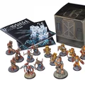A collection of detailed resin miniatures from the Sythopian Wars starter set titled "VoidSiege" is displayed prominently. The scene includes various character models and units, such as the Asylumist N-Force and the Confederation forces, arranged around two copies of the 28-page rulebook and a set of dice. A box featuring futuristic design elements is also present, adding to the thematic presentation of the game.