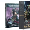 Two codex books for the Black Templars are displayed side by side. The left book features a colorful cover with a dynamic illustration of a Black Templar warrior, showcasing their iconic black armor and red accents, along with the title "WARHAMMER 40,000 BLACK TEMPLARS." The right book has a more subdued, dark cover with a striking image of Black Templar characters in action, prominently displaying the title "CODEX SUPPLEMENT Black Templars." Both books are designed for tabletop gaming enthusiasts, providing rules and lore for the Black Templars faction.