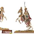 A pair of intricately designed skeletal riders on horseback, representing the Royal Heralds from the Tomb Kings faction. The riders are adorned with ornate armor featuring gold and colorful accents, while their skeletal horses exhibit detailed bone structures. The base is decorated with grass and small rocks, enhancing the overall presentation of these undead miniatures.