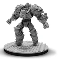 A highly detailed miniature of a large, armored mechanical figure stands on a circular base with a textured surface. The figure features intricate designs and engravings on its armor, showcasing a robust and imposing presence, with a muscular build and a fierce expression. The overall color is a light gray, emphasizing the sculpted details of the armor and the mechanical components.