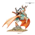 A detailed miniature depicts a Shugengan Lord riding a Great Spirit Longma, a dragon-like creature. The dragon features vibrant scales in shades of turquoise and orange, with intricate armor and decorative elements. The rider, dressed in ornate robes and armor, holds a weapon and is positioned atop a rocky base, showcasing the dynamic pose of both the rider and the dragon.