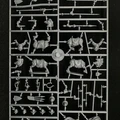 A sprue of plastic multipart miniatures featuring various components for halfling cavalry. The layout includes several halfling bodies, arms, and weapons, alongside stout pony figures. The pieces are intricately detailed, showcasing a variety of poses and accessories suitable for building a dynamic halfling army.