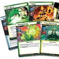 A collection of Marvel Champions: The Card Game cards features various characters and abilities. Prominent cards include Enchantress, depicted in a flowing green gown, and Loki, God of Lies, illustrated with a horned helmet and a mischievous expression. Other cards showcase minions like Absorbing Man and Sindr, along with effects such as "Spell Blast," all set against a vibrant green background.