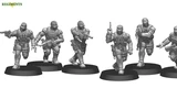 Three sci-fi miniatures are displayed, featuring stealth-suited soldiers in dynamic poses. The figures are equipped with various weapons, including a pistol and an MP7, and wear tactical gear such as body armor and goggles. Each miniature stands on a circular base, showcasing detailed sculpting and design.