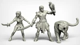 A set of three fantasy miniatures features a muscular male hero wielding a sword and holding a falcon, alongside a svelte female character brandishing a dagger. Both figures are depicted in a dynamic pose, showcasing intricate details in their clothing and accessories, reminiscent of 80s high-fantasy cinema. The miniatures are presented in a light gray color, highlighting their sculptural features.