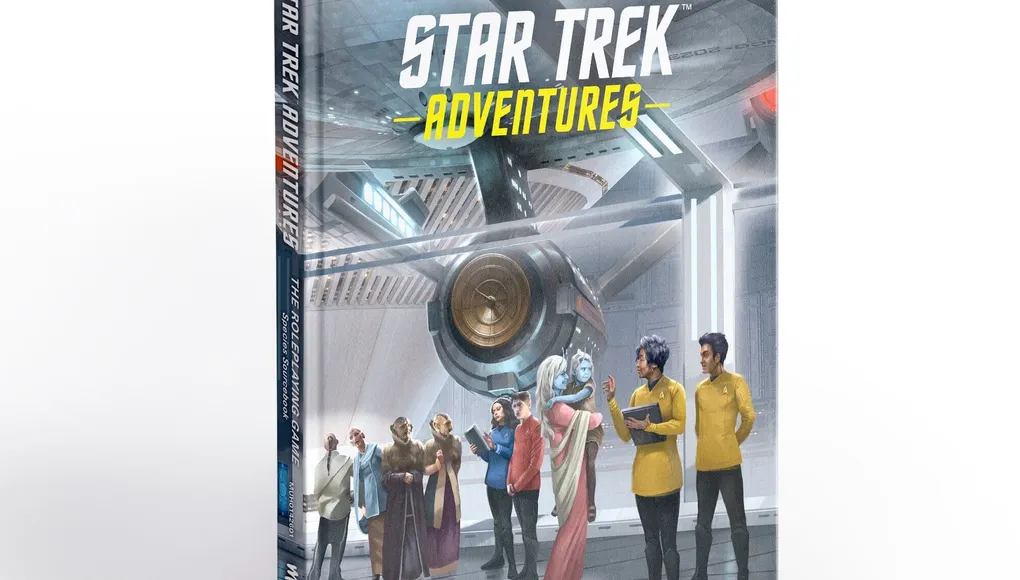 A hardcover book titled "Star Trek Adventures: The Roleplaying Game Species Sourcebook" is prominently displayed, featuring a colorful cover illustration. The scene depicts a diverse group of characters, including various alien species and Starfleet officers, gathered in a futuristic setting resembling a starship interior. The background showcases sleek technology and a large circular device, emphasizing the sci-fi theme of the Star Trek universe.