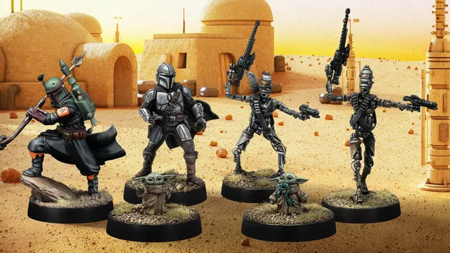 A group of four miniatures from the Star Wars universe is displayed against a desert backdrop featuring a simple structure. On the left, a character in a silver and black armor, resembling a bounty hunter, stands confidently. Next to him, two IG-Series Assassin Droids are posed with weapons drawn, showcasing their metallic bodies and intricate details. In the foreground, Grogu, a small figure with large ears, is depicted holding a small object, adding a whimsical touch to the scene. The ground is textured with grass and dirt, enhancing the overall aesthetic of the miniatures.