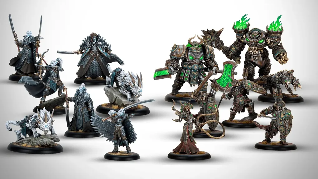 A collection of highly detailed miniatures from the new Warmachine starter set, "Frozen and Forgotten," features two distinct warbands. On the left, dark elves Nyss hunters are represented, including Lanyssa Ryssyl, a character in ornate armor, and various character warbeasts, all in dark and muted colors. On the right, the ogres Orgoth Graveborn are led by Anathia, the Imperishable Desolation, clad in heavy armor with green accents, alongside other character units, showcasing a mix of dark and metallic tones. The miniatures are set against a light background, highlighting their intricate designs.