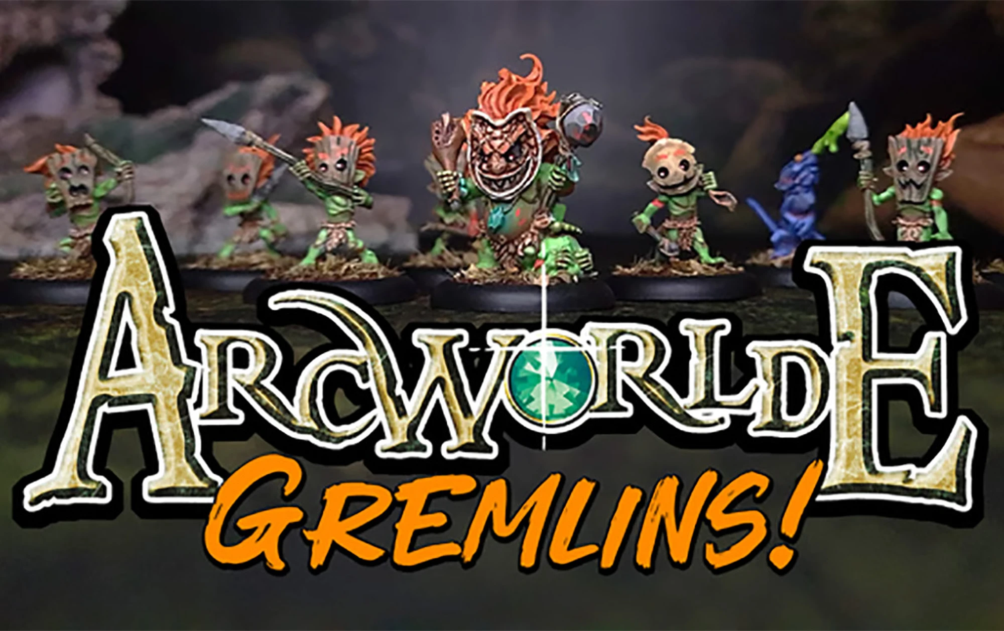 Three distinctive Gremlin miniatures are prominently displayed against a dark, forested background. The first Gremlin on the left has a wooden mask-like face and vibrant green skin, while the central Gremlin features a fierce expression with a large, toothy grin and a decorative necklace. The third Gremlin on the right holds a weapon and has a playful stance, showcasing the whimsical design typical of the ArcWorlde faction. The text "ArcWorlde GREMLINS!" is boldly featured at the bottom, emphasizing the campaign's focus.