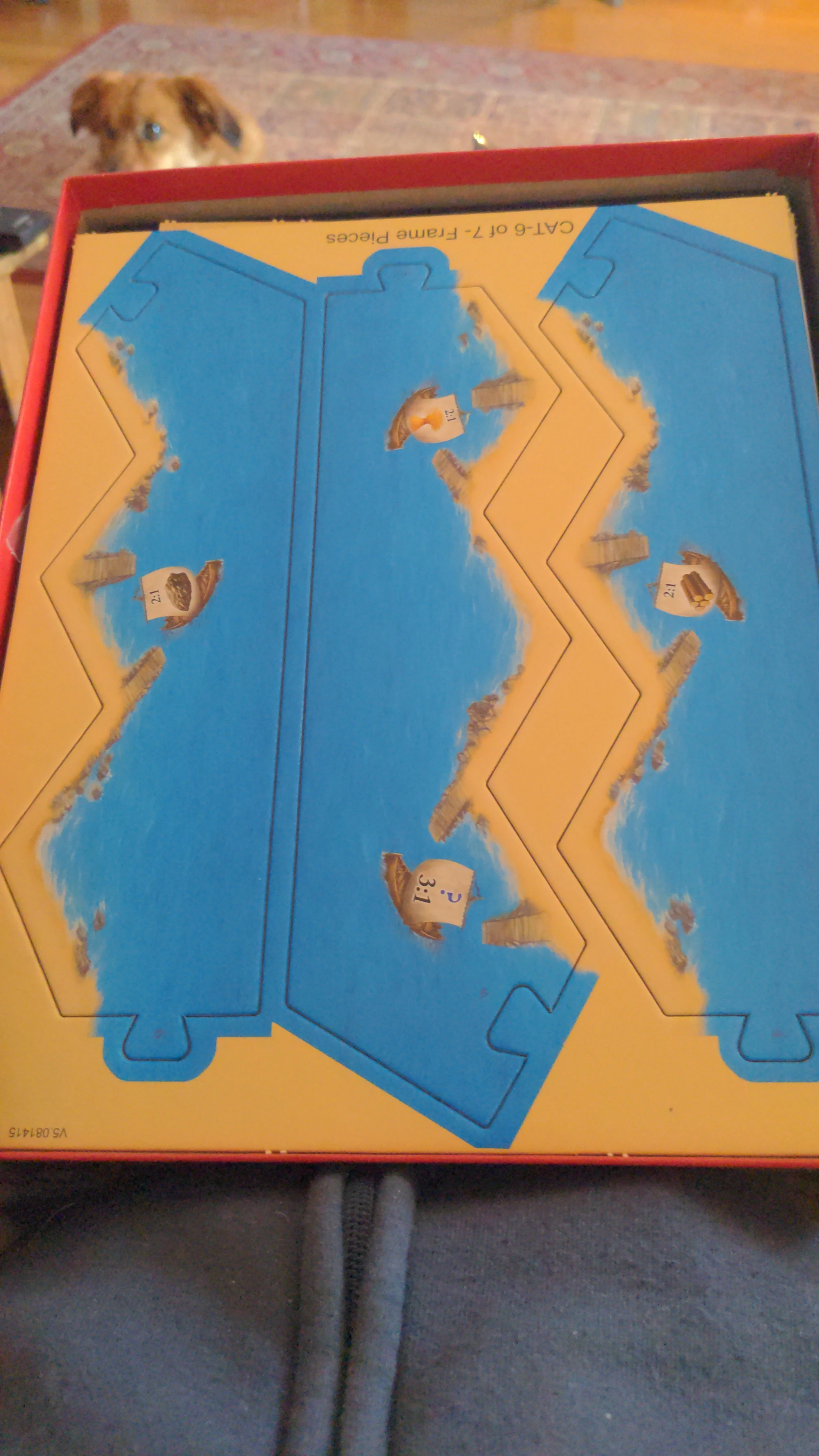 pieces for the game still in their stock cardboard