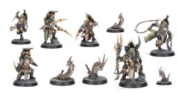 A collection of six intricately designed miniatures representing the Sha’dar Hunters from Necromunda, accompanied by their Arthromite spinewyrms. The hunters are clad in rugged, post-apocalyptic armor, featuring various weapons and gear, while the spinewyrms exhibit a segmented, menacing appearance. The bases of the miniatures are textured to resemble the harsh terrain of the Ash Wastes, enhancing the overall theme of survival in a desolate environment.