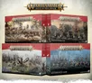 Four open box sets for Warhammer Age of Sigmar Battleforce collections. Top left: "Destruction Host" with armored warriors and a fortress under siege. Top right: "Grünta Stampede" featuring orcs and goblins charging. Bottom left: "Hammerhal" with a dragon and warriors in a snowy landscape.