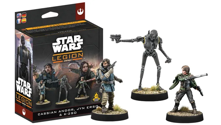 A packaging box for the Star Wars: Legion expansion featuring Cassian Andor, Jyn Erso, and K-2SO is prominently displayed. The box showcases artwork of the characters alongside their miniatures, with Cassian Andor depicted in a rugged outfit holding a blaster, Jyn Erso in a determined pose, and K-2SO, the droid, standing tall. The background includes a stylized representation of the Star Wars universe, enhancing the thematic presentation.