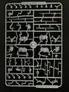 A sprue of plastic multipart miniatures featuring various components for halfling cavalry. The layout includes several halfling bodies, arms, and weapons, alongside stout pony figures. The pieces are intricately detailed, showcasing a variety of poses and accessories suitable for building a dynamic halfling army.