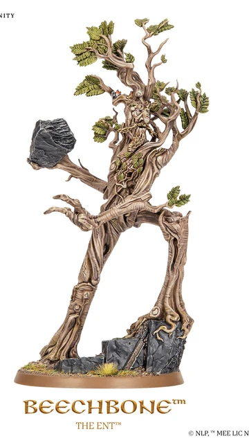 A towering model of Beechbone, an ent from the Middle-earth Strategy Battle game, stands prominently with a rugged, bark-like texture and intricate details. His limbs are gnarled and branch-like, adorned with vibrant green leaves, while he holds a large rock in one hand. The base features rocky terrain with patches of grass, emphasizing his formidable presence on the battlefield.