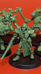 A group of five 28mm scale sci-fi miniatures is displayed against a bright red background. The figures include a Space Commando wielding a rifle, a Starchild with a distinctive helmet, an Assault Goar holding a sword, a Space Orc with a large gun, and a Voidborn equipped with various gadgets. Each miniature features intricate details and a classic old-school aesthetic, showcasing the unique character and charm of the RT Adventurer Pack II from Satyr Art Studios.