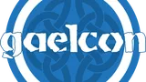 A circular logo featuring a blue background with a white outer ring. In the center, a stylized knot pattern is visible, symbolizing Celtic design. The word "gaelcon" is prominently displayed in white, with a slightly distressed font, emphasizing the convention's name.