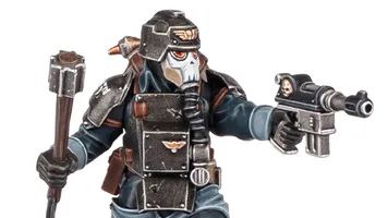 A detailed miniature figure of a Death Korps of Krieg Combat Engineer, wearing a dark uniform and a distinctive helmet with a skull motif. The figure is equipped with various tools and weapons, including a pistol in one hand and a device in the other. The overall color scheme features dark tones with metallic accents, emphasizing the character's militaristic design.
