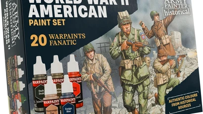A paint set titled "World War II American Paint Set" features a box design showcasing three American soldiers in historical uniforms, set against a backdrop of crumbling walls. The box includes five paint bottles prominently labeled "WARPAINTS FANATIC," with colors such as "Dark Drab," "Medium Drab," "Paratrooper Tan," "Tang Red," and "Ensign Blue." The text emphasizes "20 WARPAINTS FANATIC" and "AUTHENTIC COLOURS FROM HISTORICAL SOURCES," highlighting the set's focus on historical accuracy.