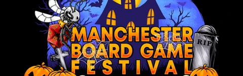 A vibrant graphic features the text "MANCHESTER BOARD GAME FESTIVAL" prominently displayed in bold, orange letters against a dark, spooky backdrop. The scene includes a haunted house with glowing windows, bats flying in the night sky, and various Halloween-themed elements like pumpkins, skulls, and spider webs. The overall atmosphere is festive and eerie, perfectly capturing the Halloween spirit of the event.