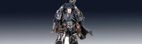 Kaedes Nex, the Moritat-Prime of the Raven Guard, stands prominently in the image, showcasing intricate details in his armor. He is clad in dark, metallic blue and silver, with a flowing black cape and various pouches and weapons attached to his belt. His helmet features a distinctive design, and he holds a weapon in one hand, while a small device is mounted on his shoulder, emphasizing his role in covert operations. The base is textured with a sandy finish, enhancing the overall presentation of this formidable character.