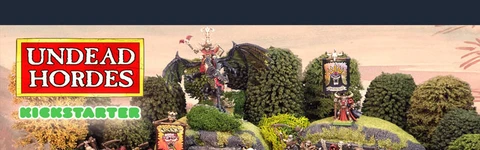 The scene features a vibrant tabletop display showcasing the "Undead Hordes" miniatures from Red Bard Games' Kickstarter campaign. In the foreground, a variety of skeletons and zombies are arranged on grassy terrain, with some holding banners and others in dynamic poses. A prominent liche king rides a zombie dragon atop a rocky outcrop, while additional figures, including a necromancer and various undead warriors, populate the scene, surrounded by lush greenery and stone formations. The overall composition exudes a classic fantasy aesthetic, emphasizing the theme of an undead army ready for battle.
