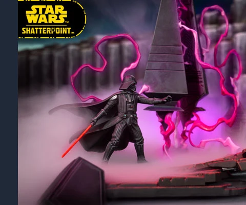 The image features a dynamic scene from the Star Wars: Shatterpoint game, showcasing miniatures of Ahsoka Tano and Darth Vader engaged in a duel. Ahsoka, wielding two lightsabers, is positioned in an action pose, while Darth Vader stands menacingly with his red lightsaber drawn. The backdrop includes a detailed scenic terrain piece resembling a Sith temple, with swirling purple energy and mist adding to the dramatic atmosphere of their confrontation.