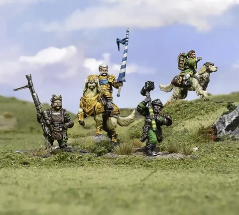A group of halfling miniatures stands on a grassy terrain, showcasing their unique characteristics. In the center, a halfling in ornate armor rides a large, lion-like creature, holding a blue and white banner. To the left, another halfling wields a spear, while a third, dressed in green, brandishes a hammer. A fourth halfling rides a smaller, dog-like creature, completing the ensemble of pint-sized warriors. The background features a soft blue sky with scattered clouds, enhancing the whimsical atmosphere.