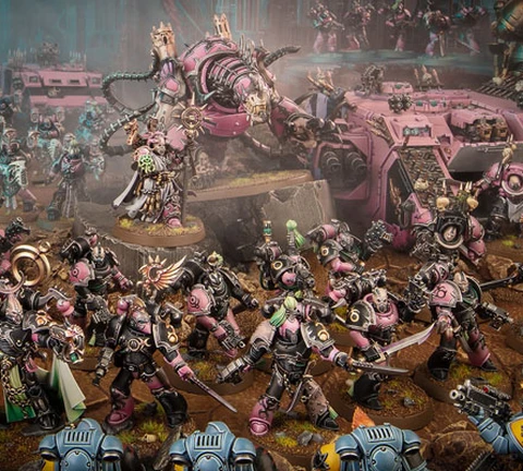 The image features a dynamic scene filled with a multitude of Emperor’s Children miniatures from the Warhammer 40,000 universe, showcasing their vibrant pink and purple color scheme. In the foreground, a diverse array of Chaos Space Marines, adorned with ornate armor and chaotic symbols, engage in battle, while a towering, menacing figure looms behind them, possibly a Daemon Engine or a warlord. Several vehicles, including armored transports, are also present, adding to the chaotic atmosphere of the battlefield, which is set against a dark, atmospheric backdrop. The overall composition emphasizes the flamboyant and hedonistic nature of the Emperor’s Children, reflecting their devotion to Slaanesh.