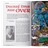 A vibrant magazine spread features a colorful illustration depicting a chaotic scene with various fantasy characters, including armored warriors, a wizard, and a troll, all engaged in a tabletop gaming session. The left page contains an interview titled "Dwarf Days are OVER," with bold red text and a black-and-white photograph of Paul Cockburn, who is discussing his experiences in the gaming industry. The overall design combines dynamic artwork with engaging text, reflecting the nostalgic and adventurous spirit of classic RPGs and wargames.