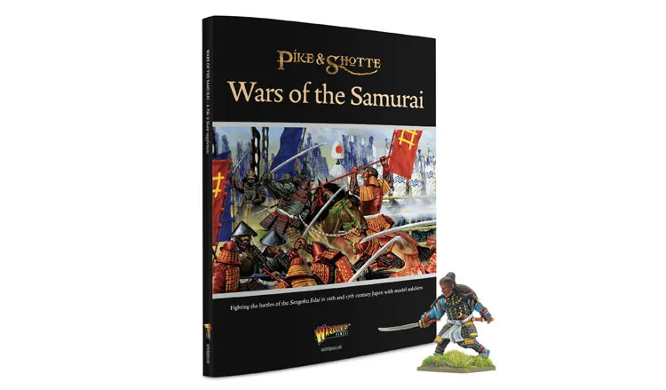 The image features the cover of the "Wars of the Samurai" supplement for the Pike & Shotte tabletop game, prominently displaying a vibrant illustration of a 15th and 16th-century Japanese battle scene, complete with samurai warriors in traditional armor wielding weapons and banners. To the right, there is a detailed miniature of Yasuke, the Black Samurai, depicted in a dynamic pose, dressed in colorful armor and holding a sword. The book's title is elegantly printed in gold lettering at the top, with the Warlord Games logo at the bottom.