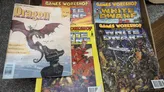 A selection of eary 90s white dwarf and dragon magazines showing the classic stylings