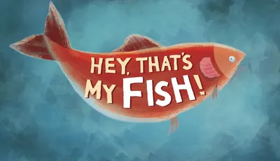 A stylized illustration of a fish, prominently featuring the title "HEY, THAT'S MY FISH!" in bold, playful lettering. The fish is depicted in a vibrant reddish-orange color with a slightly whimsical design, set against a soft, blue-toned background that suggests an underwater environment. The overall composition conveys a fun and engaging theme, suitable for a family-friendly board game.