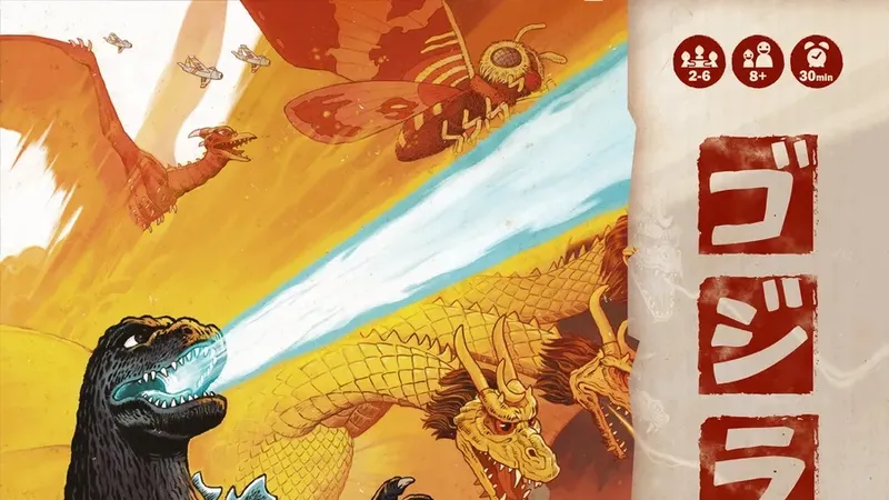 A dynamic illustration features Godzilla prominently in the foreground, unleashing a powerful atomic breath. Behind him, King Ghidorah soars with its three heads, while Mothra and Rodan are depicted in flight above. The game's title, "King of Tokyo Godzilla," is displayed prominently, along with the IELLO logo and player information in the top corner. The background is filled with vibrant colors, creating an intense atmosphere of battle among the iconic Kaijus.