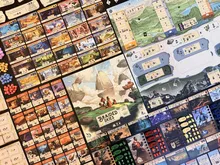 Braided Skies game board with cards and components spread out.